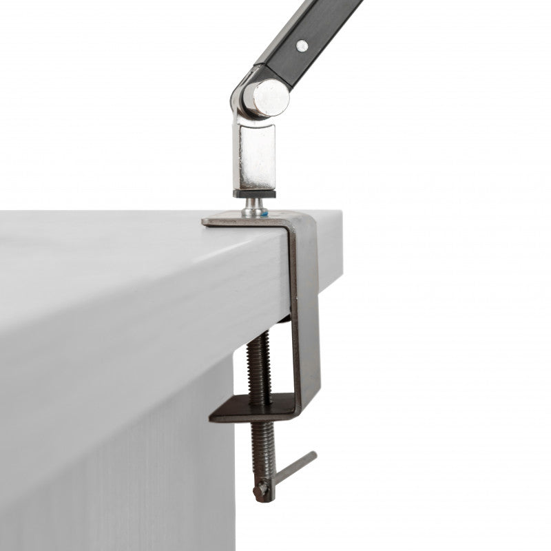 Foldable portable desk lamp by BVShop showing adjustable arm and bright LED light on a white desk.
