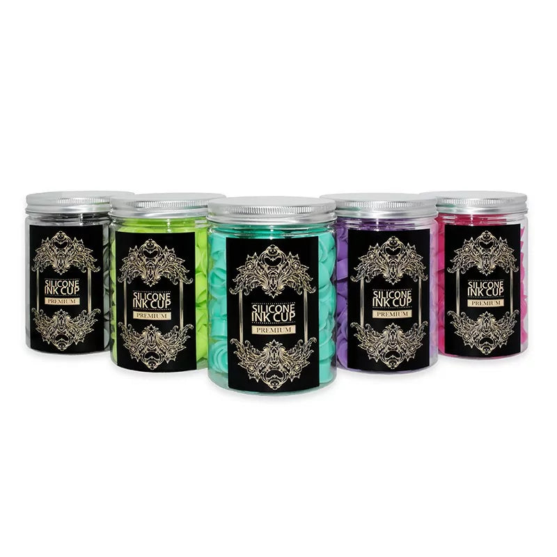 Set of 100 AVA premium silicone tattoo ink cups, 12mm diameter, used for holding ink during tattooing processes.