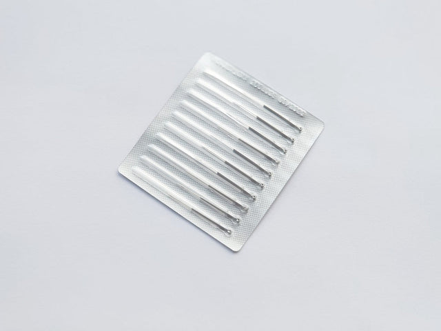 Set of 10 plasma pen disposable needles by Beauty System, small metal tips for skin treatment procedures.